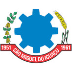  Criado pela Lei Municipal n 22/1971 de 16 de Novembro de 1971, tendo sua redao alterada pela Lei Municipal n 588/1991 de 06 de Setembro de 1991.     Atualmente compe-se de um escudo representado por uma engrenagem de 8 (oito) dentes truncados, na cor azul, que simbolizam a unio e o progresso do Municpio. Do lado direito do escudo figura um ramo de soja frutificado, em suas cores, e, do lado esquerdo, figura uma haste de trigo frutificada e em suas cores; ambos representam as principais riquezas do Municpio.     Um listel, em vermelho, na parte inferior do escudo, traz a inscrio "1951 SO MIGUEL DO IGUAU 1961", na cor branca, que correspondem, respectivamente,  data de fundao, o topnimo e data de emancipao poltico-administrativa. 